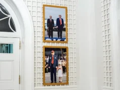 Trump Hangs Putin Portrait in White House Palm Room Above Granddaughterβs Photo, Sparking Global Outrage