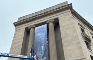 Huge Trump Banner Looms Over Justice Department HeadquartersβViral Reactions Say The Scene βScreams, DICTATORβ